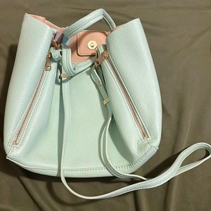 Marine blue Ann Taylor handbag. (with adjustable shoulder strap).